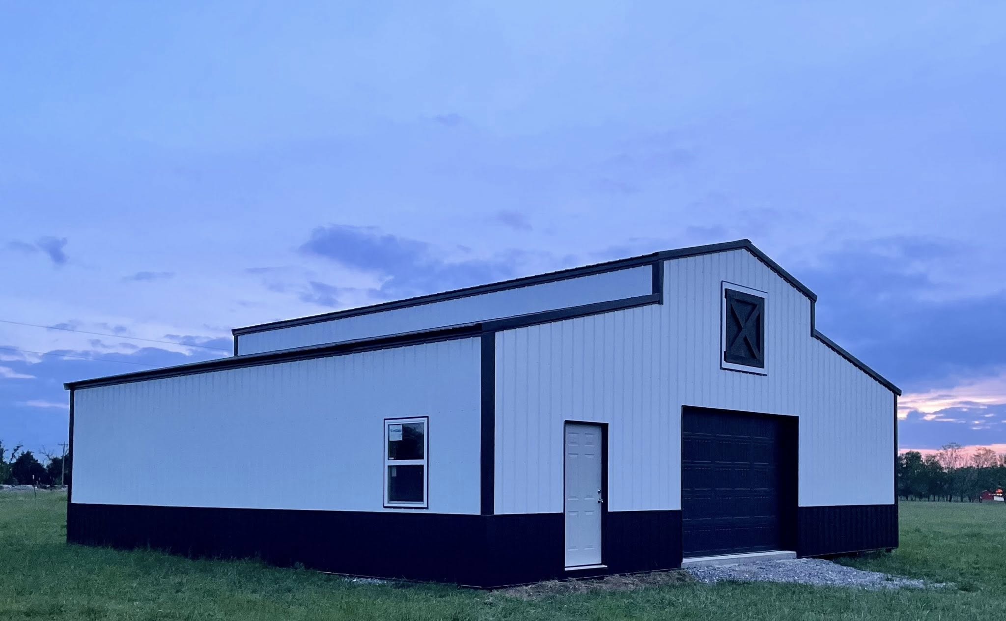 White barn at dusk